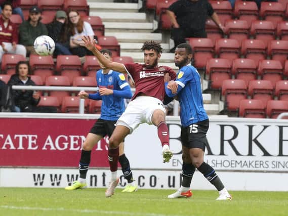 Kion Etete was wrestled the floor on several occasions against both Rochdale and Wimbledon.