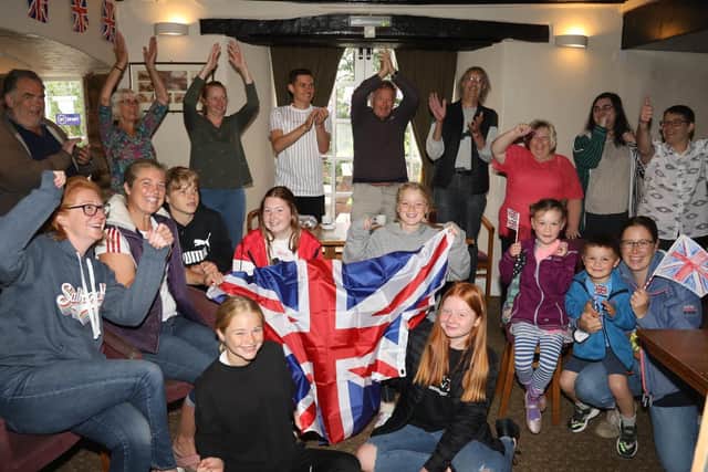Villagers celebrate at The Hill