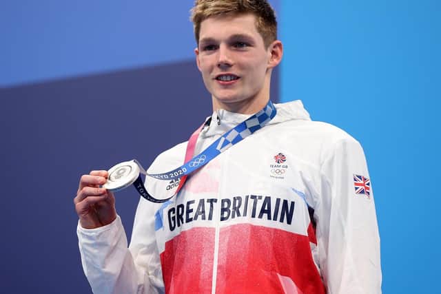 Swimmer Duncan Scott with his gold medal at the Tokyo Olympics last month. Photo: Getty Images