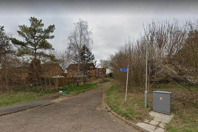 The alleyway that joins the A45 slip road and Butts Road in East Hunsbury.
