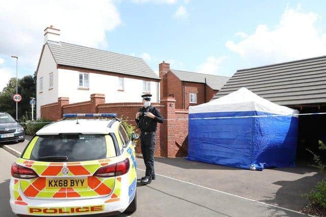 Police at the scene on Friday.