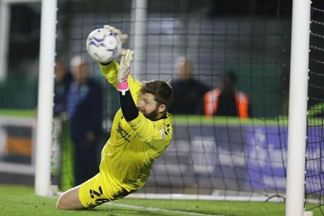 Jonny Maxted saves Jamille Matt's penalty in the shootout at Forest Green