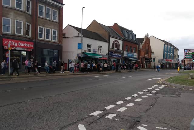 Queues outside The Schoolwear Shop in Abington Square, Northampton. Photo: @ANorthantsfan/Twitter