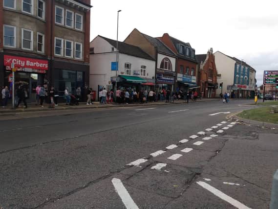 Queues outside The Schoolwear Shop in Abington Square, Northampton. Photo: @ANorthantsfan/Twitter