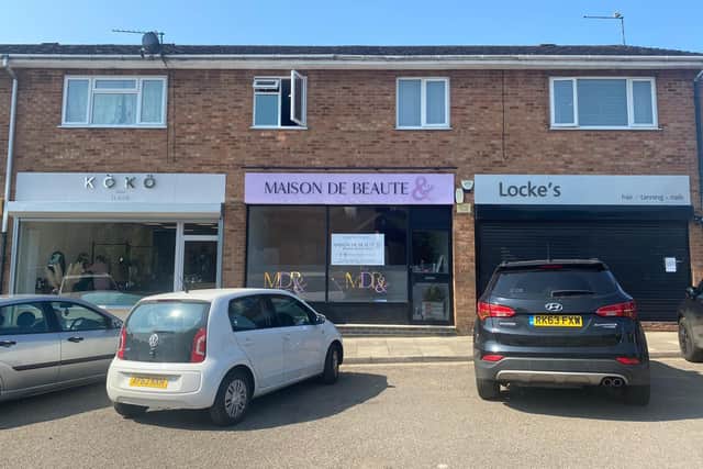 Emily says the row of shops is looking a lot better after her renovations and another business' work.