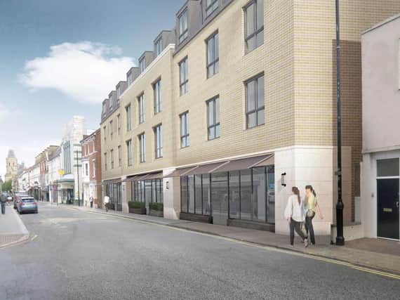 An artists' impression of the block of flats on the vacant plot on St Giles' Street, Northampton. Photo: Strettons