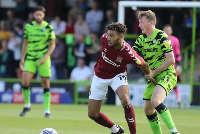 Kion Etete holds off his man. Pictures: Pete Norton.