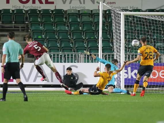 Jon Guthrie smashes home the Cobblers' winning goal at Newport County (Picture: Pete Norton)