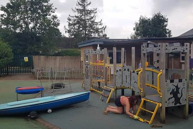 Volunteers painted parts of the garden to refresh it.