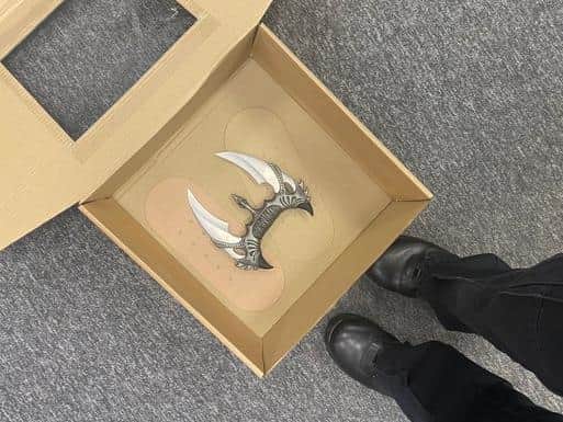 This double-bladed item was among the deadly weapons seized by police