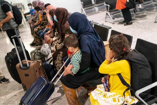 Refugees arriving at Heathrow. (File picture).