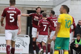 Fraser Horsfall celebrates scoring the Cobblers' late equaliser (Pictures: Pete Norton)