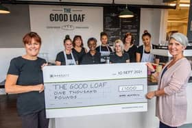 Chief executive at The Good Loaf, Suzy Van Rooyen (left) and Jacqui Patrick of Barratt Homes, with the £1,000 cheque.