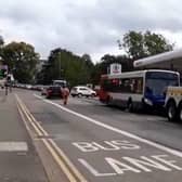 The broken down bus caused huge queues outside Westbridge Motors on Tuesday morning