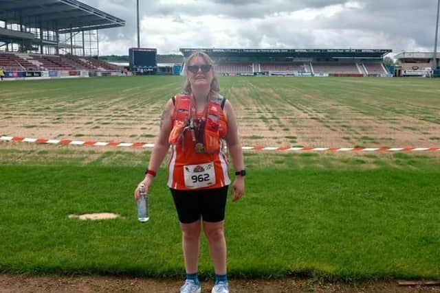 Libby running her first 10 kilometers as part of her training for the London Marathon.