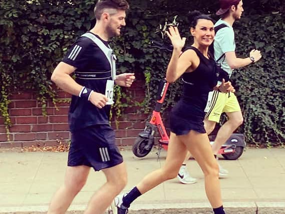 Sarah Beard and her partner of 17 years, James Marshall, running the Northampton Half Marathon.