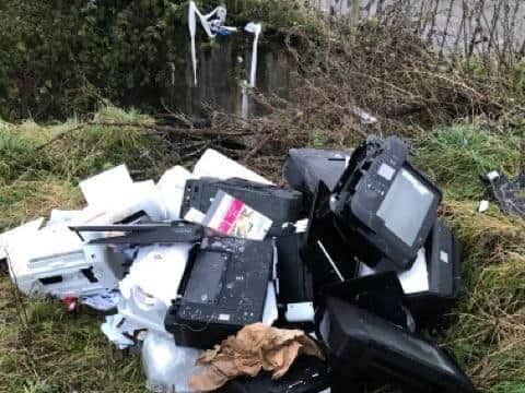 A Northampton firm was fined £4,200 after a pile of printers were found dumped in Lower Ecton Lane