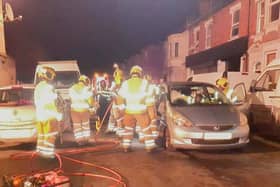 Firefighters worked to free the trapped woman following last night's shunt