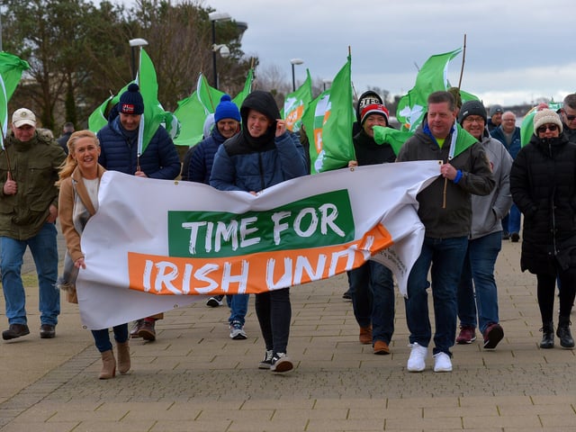 Ciara Ferguson MLA, Padraig Delargy MLA and Colr. Conor Heaney carry a banner during the Walk for Unity, along the Foyle embankment on Saturday morning last, calling on the British government for a referendum on Irish unification. Photo: George Sweeney. DER2208GS – 091