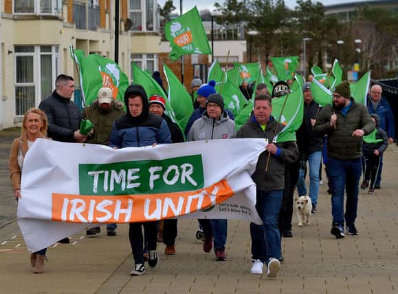 A Walk for Unity, calling on the British government for a referendum on Irish unification, making its way along the Foyle Embankment on Saturday morning last. Photo: George Sweeney.  DER2208GS – 092