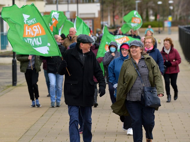Some of the participants who took part in the Walk for Unity, along the Foyle embankment on Saturday morning last, calling on the British government for a referendum on Irish unification. Photo: George Sweeney. DER2208GS – 094