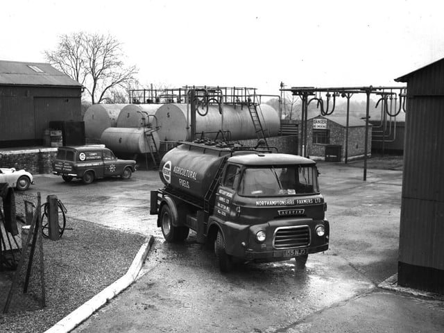 Northamptonshire Farmers Ltd, Far Cotton Mill, Northampton, February 21, 1964. The Austin Healey "Frogeye" Sprite of Chron photographer Alan Burman can be seen on the left.