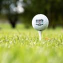 Close-up of a SSAFA-branded golf ball from a recent golf day.