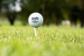 Close-up of a SSAFA-branded golf ball from a recent golf day.