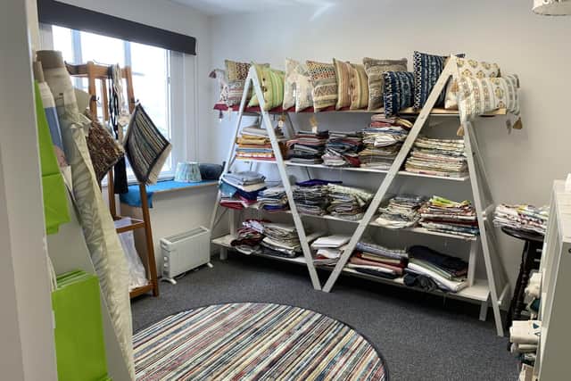 The founder recently opened a small shop area in support of Cynthia Spencer, and the proceeds of any remnants sold are donated to the charity.