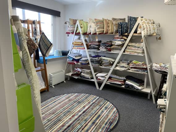 The founder recently opened a small shop area in support of Cynthia Spencer, and the proceeds of any remnants sold are donated to the charity.