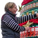 Tesco’s tree is made from the items that are needed the most at this time of year