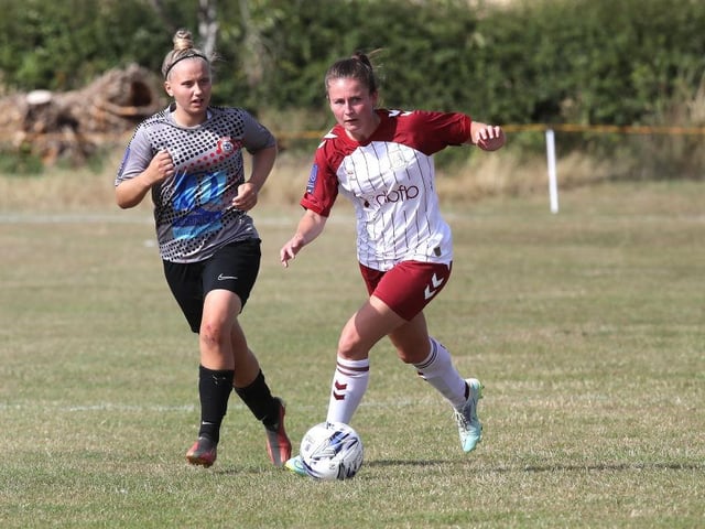 Abbie Brewin evades Wem's Alise Gindra