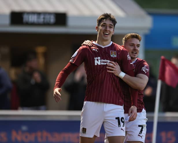 Kieron Bowie celebrates after giving Cobblers the lead against Cambridge with his first goal of the season. Picture: Pete Norton