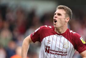 Dyche has made 26 appearances for the Cobblers