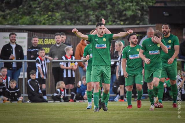 Duane Morgan celebrating scoring against Moulton, photo by Richard Eason.