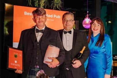 The Old Cherry Tree team with the Pub Partners award.