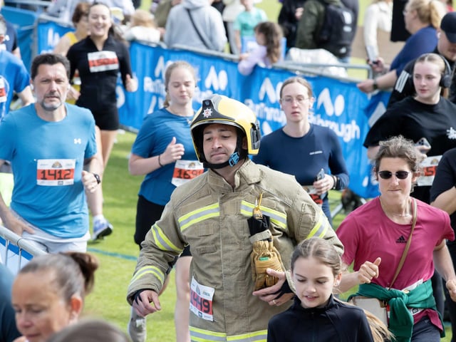 Hundreds of runners braved showers and wind to take on the race on Sunday (May 25), which started and finished at Sixfields stadium.