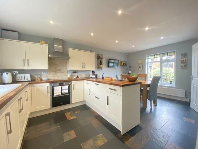 A farmhouse kitchen boasts the best of traditional style with modern facilities