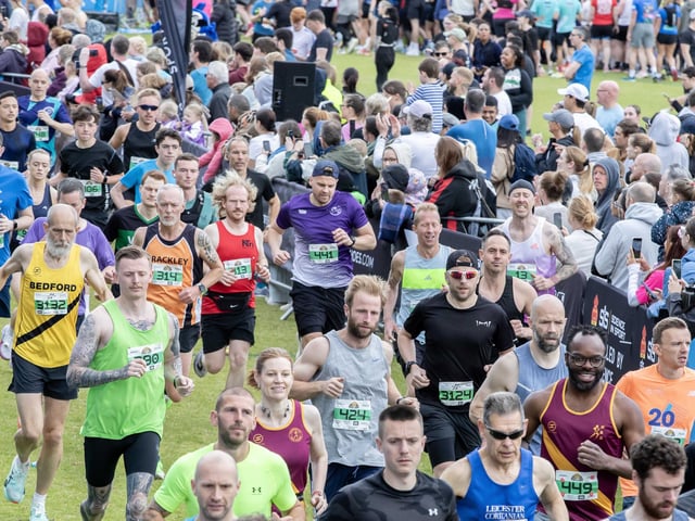 Hundreds of runners braved showers and wind to take on the race on Sunday (May 25), which started and finished at Sixfields stadium.