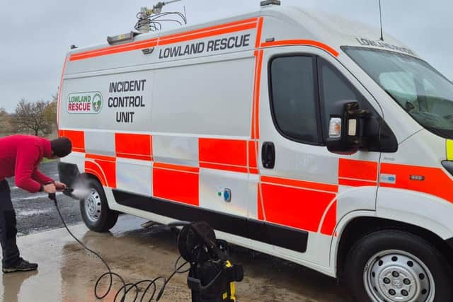 Cleaning vehicles back at base