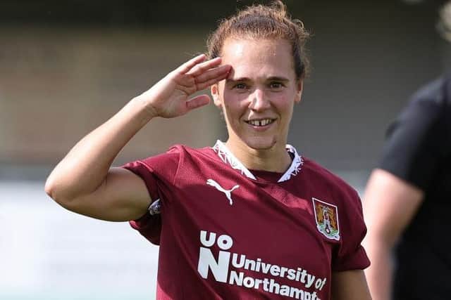 Jade Bell salutes after scoring one of her 20 goals this season