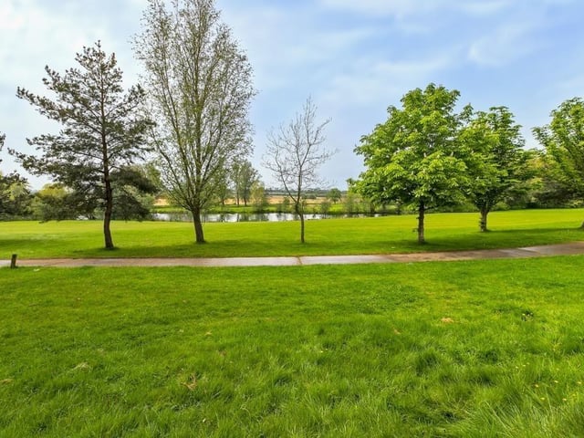 The property has wonderful views of Collingtree Park Gold Course and its lake