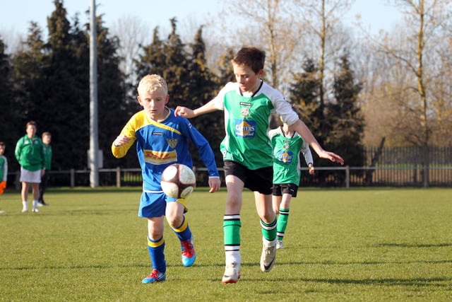 Action from NTFA All Weather Cup under 11 between Grange Park Rangers and Towcester Town at Studland Road.
