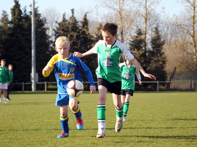 Action from NTFA All Weather Cup under 11 between Grange Park Rangers and Towcester Town at Studland Road.