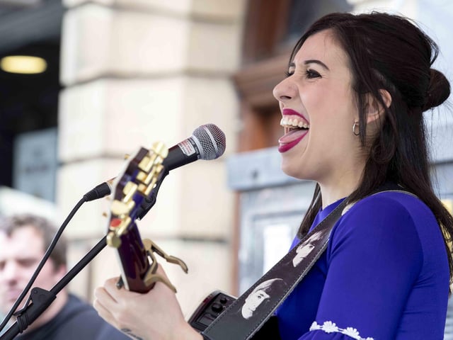 Hundreds enjoyed music, circus acts, and memories from the decade during a sixties celebration event in Northampton's Market Square on Saturday (September 24).