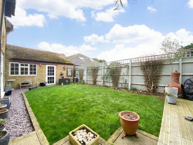 The property has a square back garden with wooden decking and plenty of space to entertain