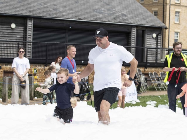 A family-friendly fun run, with water slides and obstacles, took place at Upton Country Park on Saturday (August 12) to raise funds for a Northampton charity.