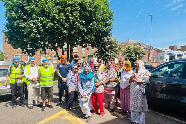 Unity walkers outside hte Gurdwara, Criomwell Street