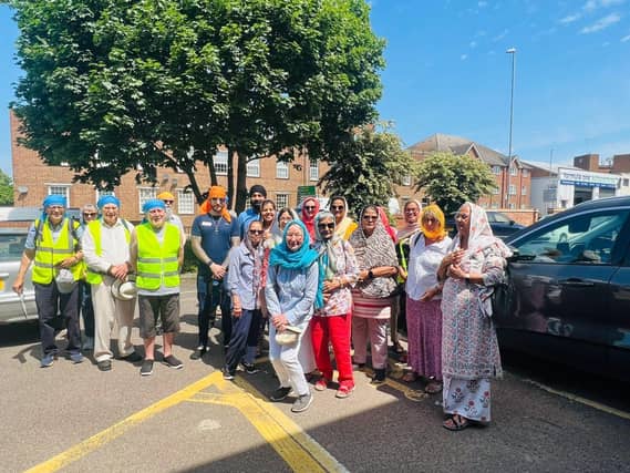 Unity walkers outside hte Gurdwara, Criomwell Street