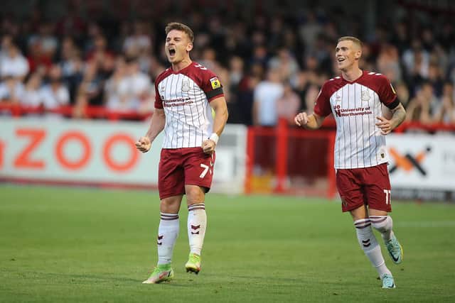 Sam Hoskins celebrates scoring his second goal at Crawley Town on Tuesday night (Picture: Pete Norton)